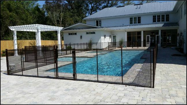 Large beautiful fence with 3 gates.