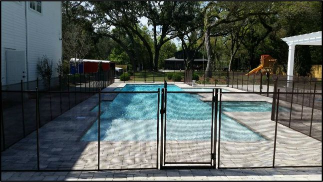 Large beautiful fence with 3 gates.