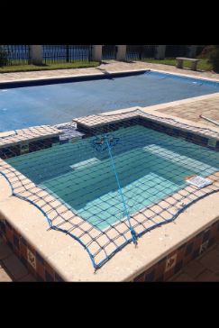 Pool Safety Cover with additional Pool Safety Net.